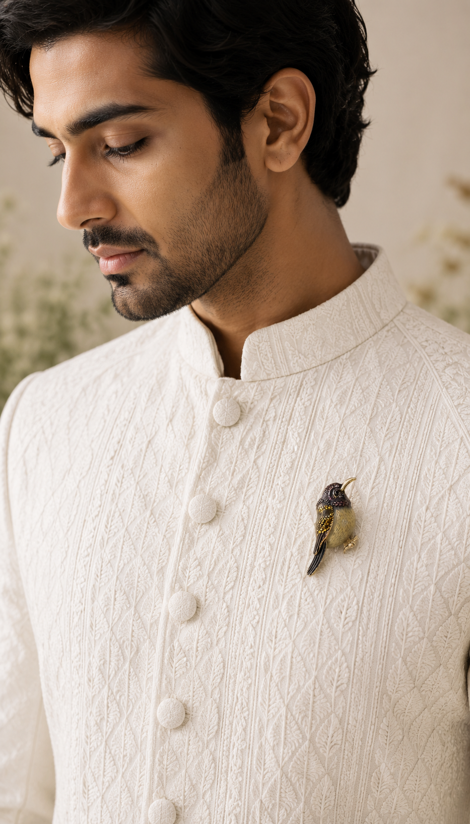 Twilight Hummingbird Crystal Brooch worn on an ivory traditional jacket
