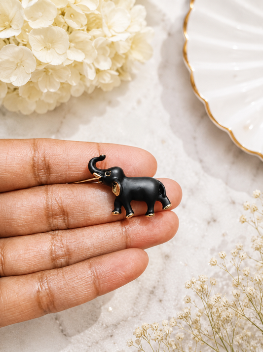 Midnight Charm Elephant Brooch shown close up in hand