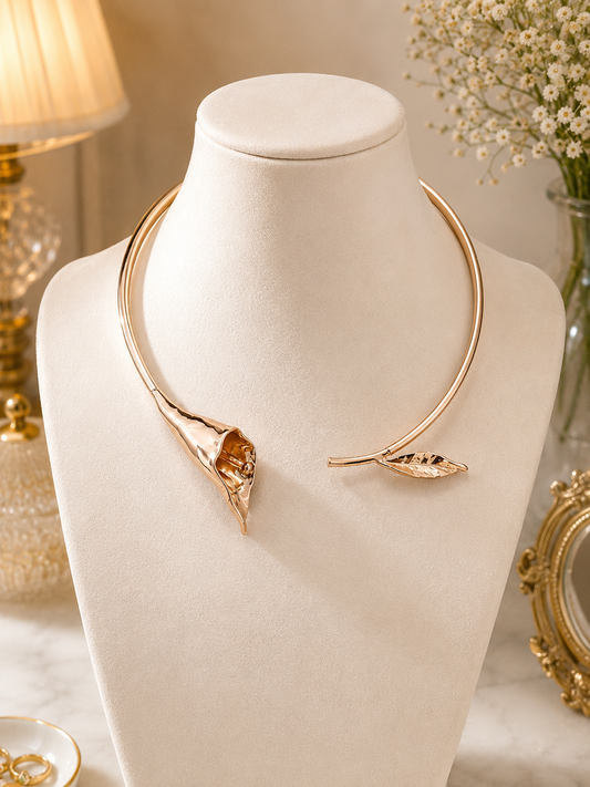 Rose-gold stainless-steel calla-lily choker displayed on a bust