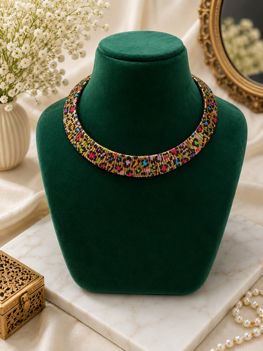 Rainbow Mosaic Enamel Necklace Set displayed on a styled jewellery bust