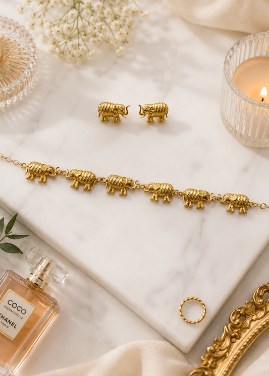 Royal Elephant Necklace Set with matching elephant stud earrings displayed on marble background.