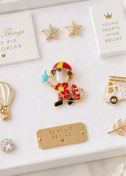 Red fireman brooch