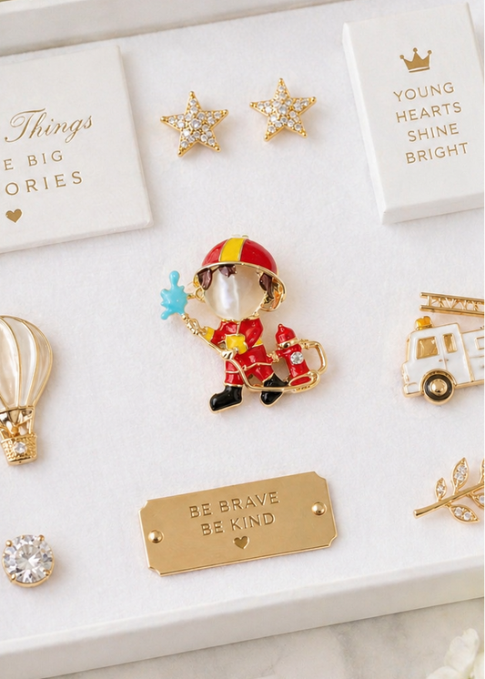 Red fireman brooch