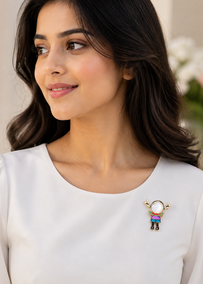 Woman wearing a colorful girl brooch on a white background