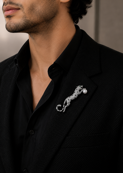 Midnight Pearl Panther Brooch worn on a black blazer