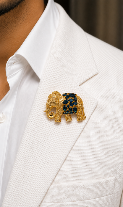 Royal Blue Elephant Brooch worn on a white jacket by a man