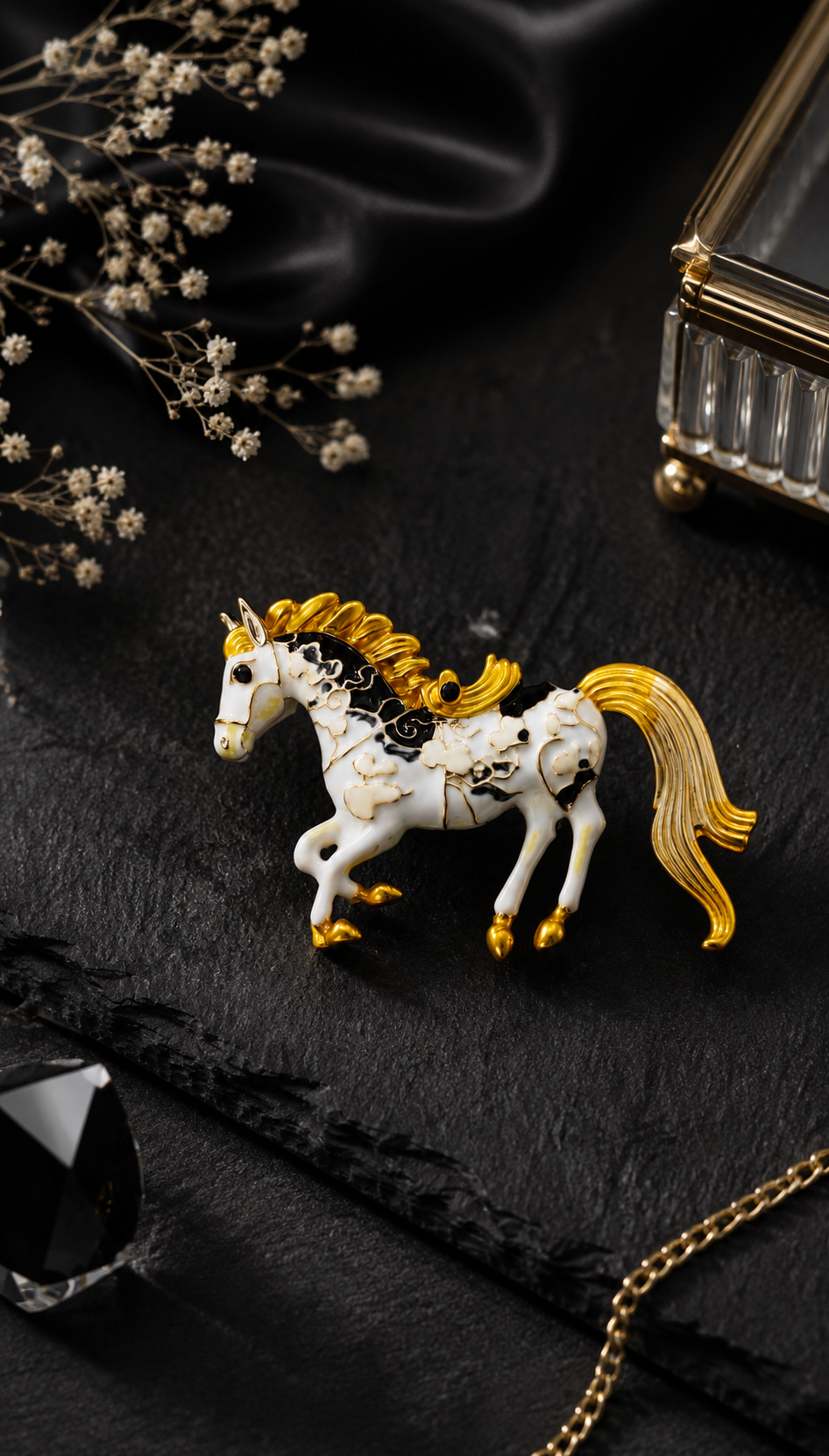 Golden Stallion Enamel Brooch displayed in a dark studio flat lay