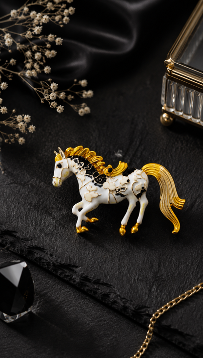 Golden Stallion Enamel Brooch displayed in a dark studio flat lay