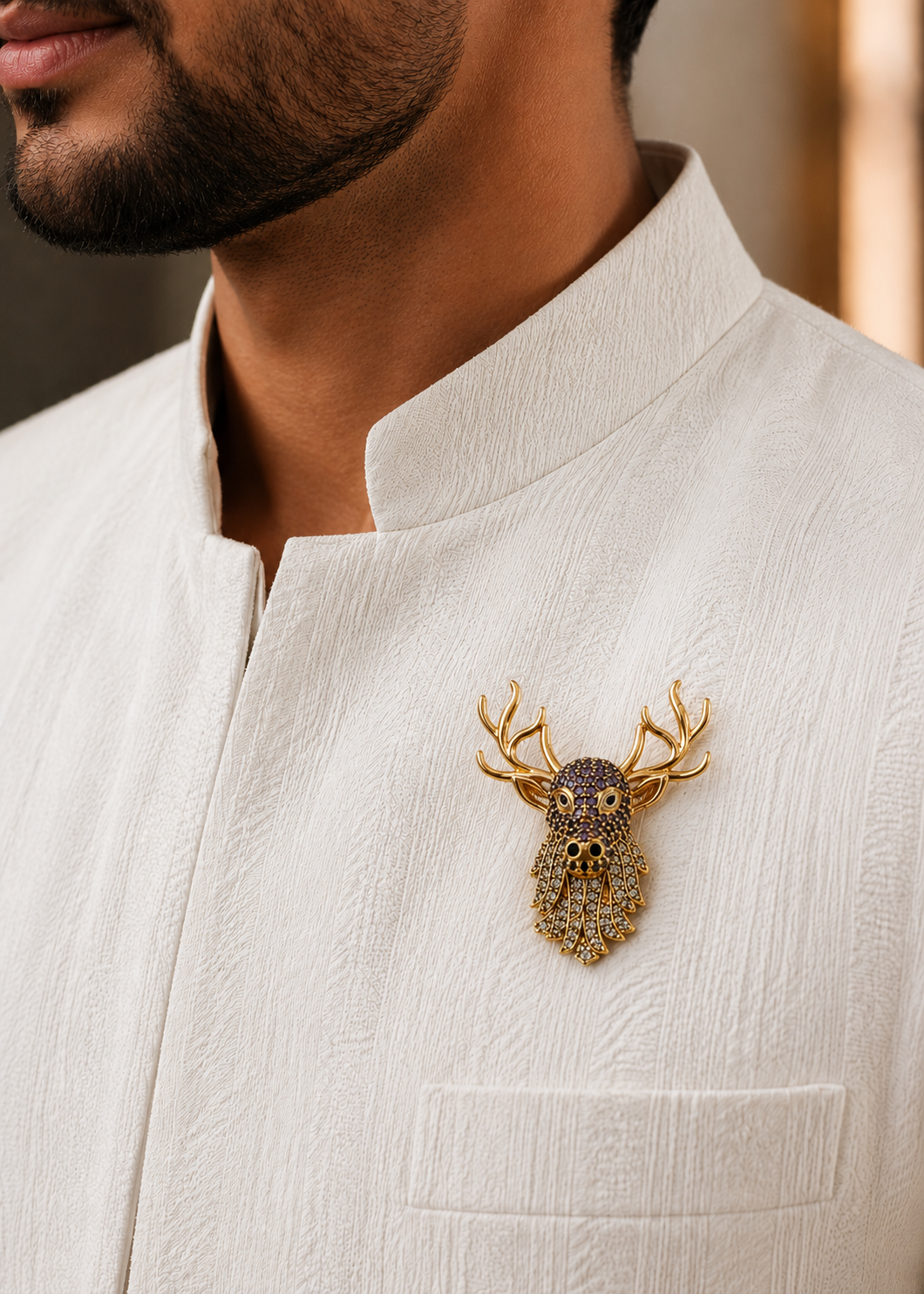 Celestial Stag Crystal Brooch worn on a white jacket by a man