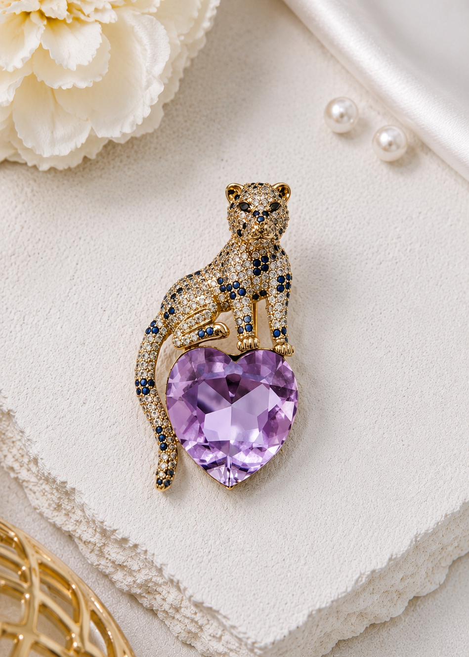 Lavender Heart Panther Brooch displayed in a light studio flat lay