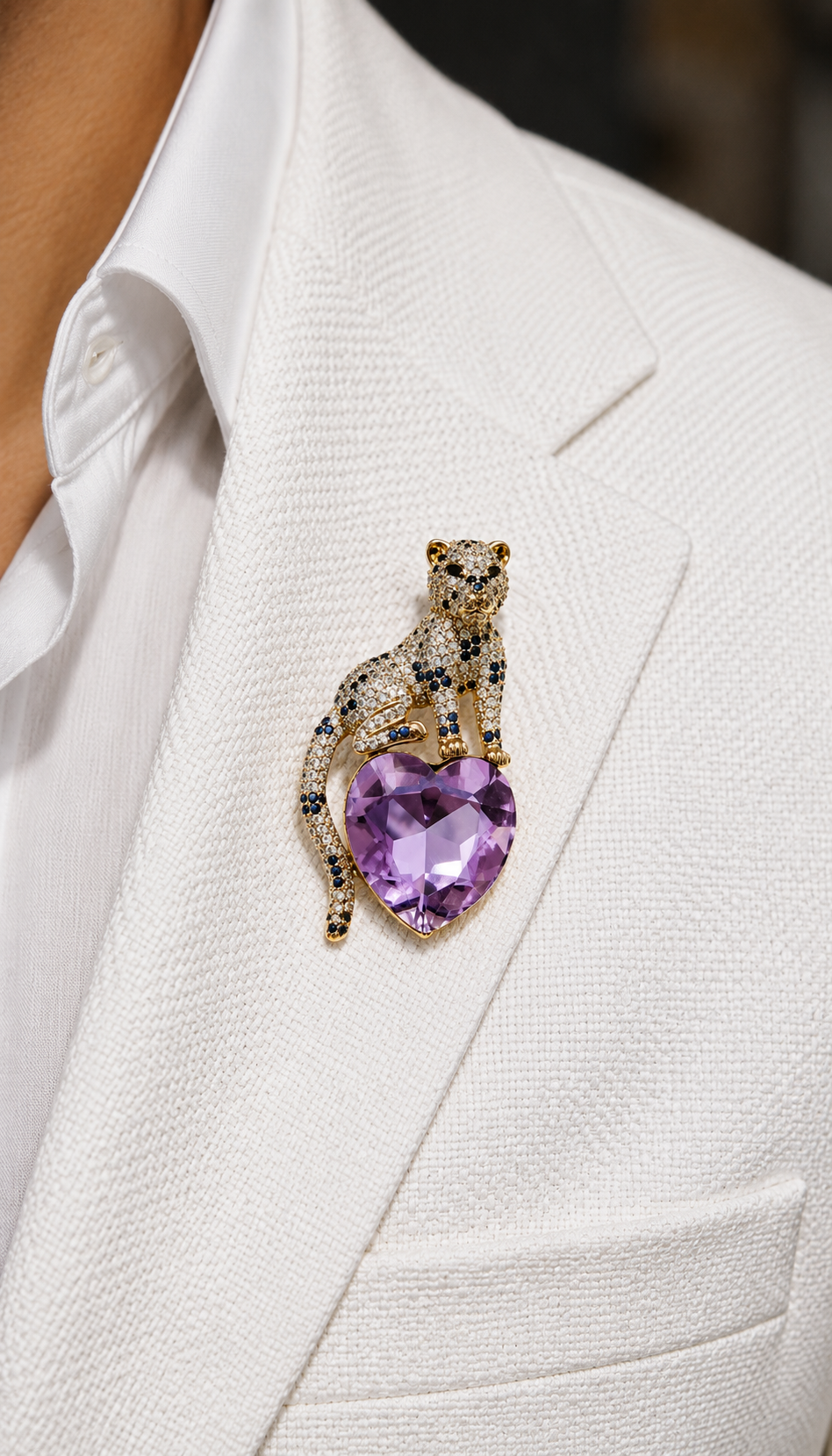 Lavender Heart Panther Brooch worn on a white jacket