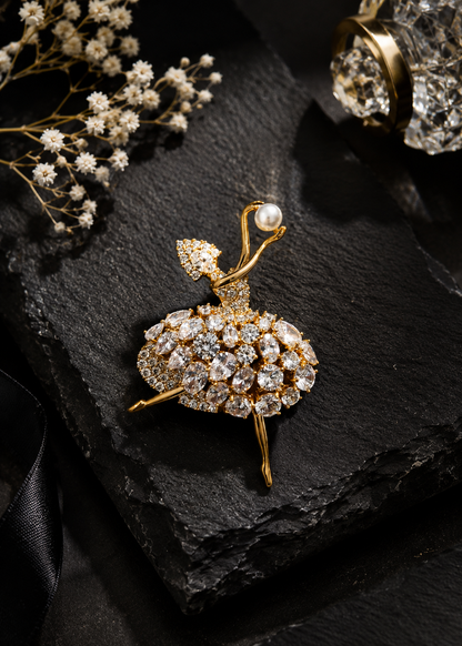 Pearl Pirouette Crystal Dancer Brooch displayed in a dark studio flat lay