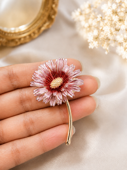 Blush Daisy Stem Brooch shown close up in hand