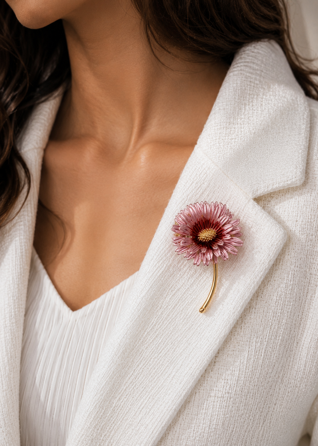 Blush Daisy Stem Brooch worn on a white blazer