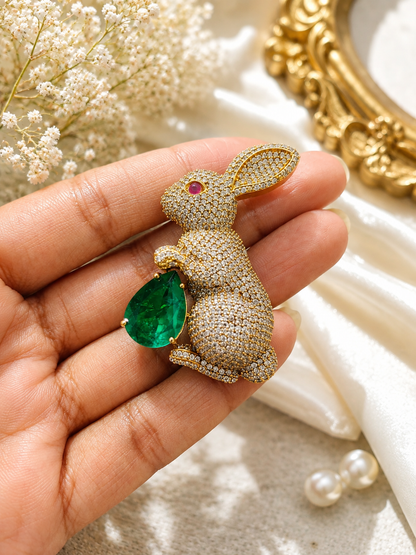Emerald Bunny Crystal Brooch shown close up in hand