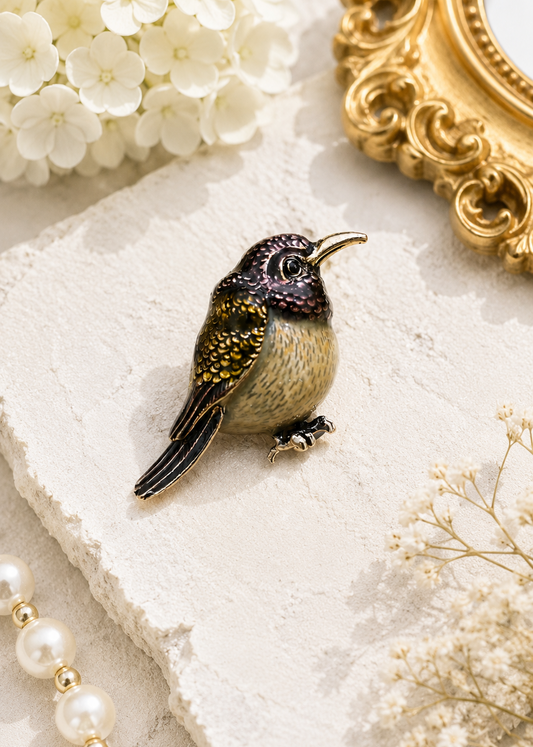 Twilight Hummingbird Crystal Brooch displayed in a light studio flat lay