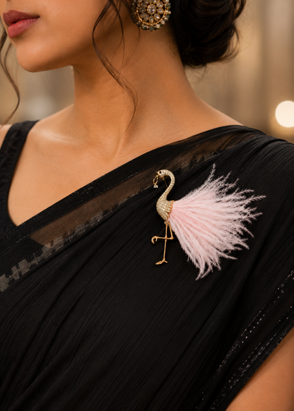 Blush Plume Flamingo Brooch worn on a black sari