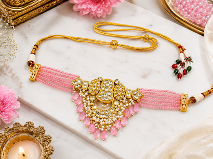 Blush Kundan Pearl Choker Necklace shown in a styled flat lay