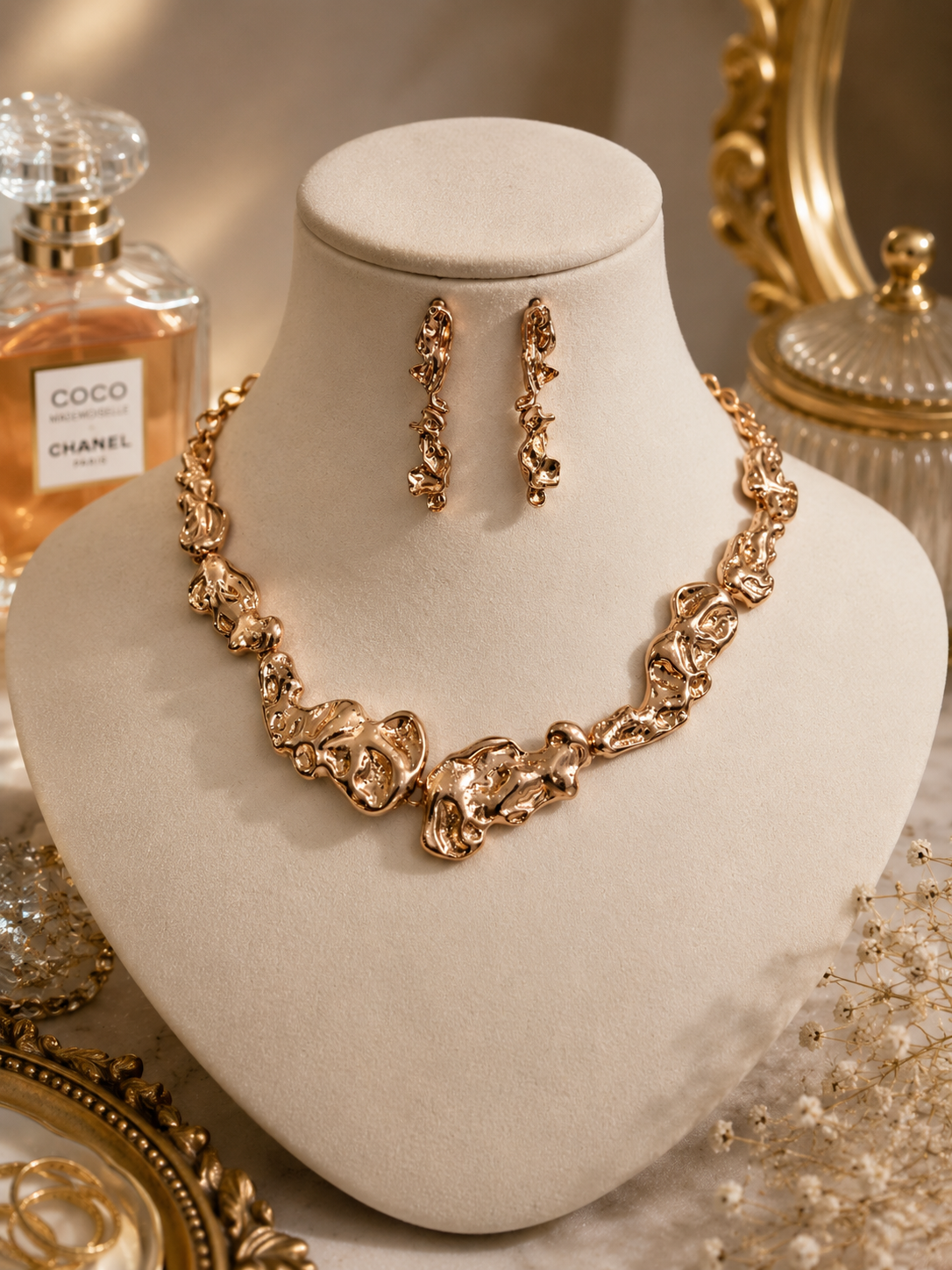 Rose Cascade Floral Necklace Set displayed on a jewellery bust with matching earrings