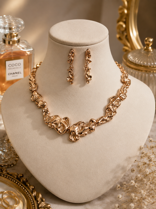 Rose Cascade Floral Necklace Set displayed on a jewellery bust with matching earrings