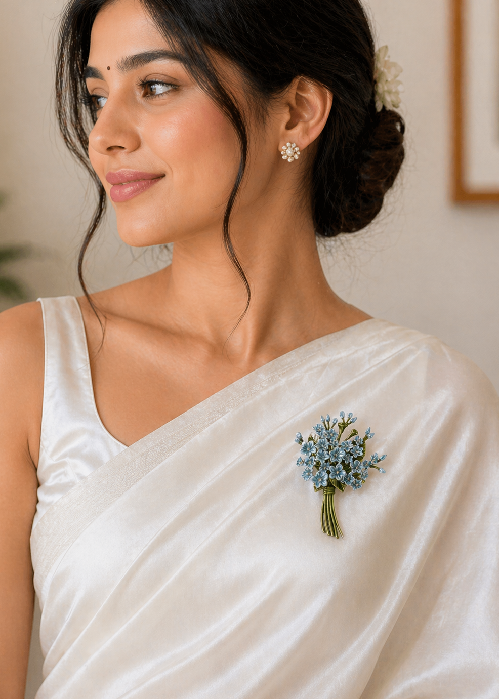 Woman wearing Bloom Elegance Blue Floral Brooch on a white saree