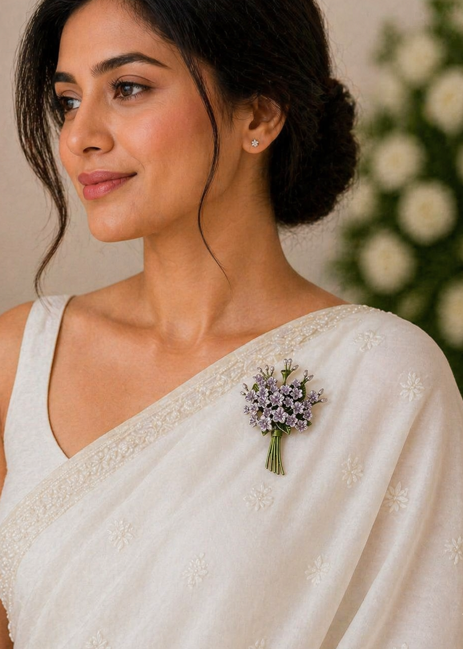 Woman wearing Bloom Elegance Purple Floral Brooch on a white saree