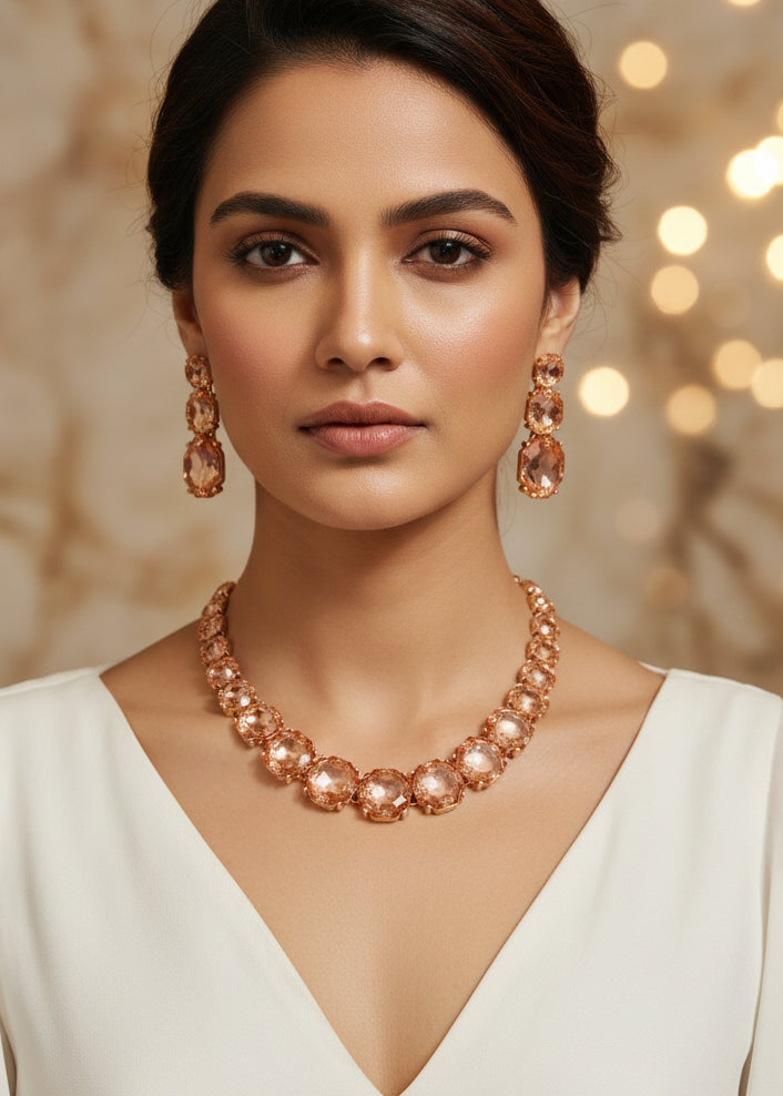 Model wearing Blush Crystal Statement Necklace Set with matching crystal earrings