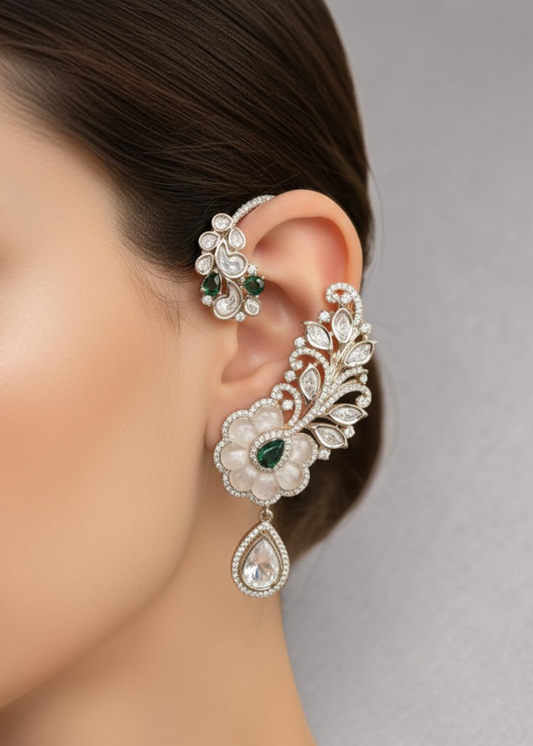 Emerald Bloom Ear Cuff Set featuring green crystal floral ear cuff with cascading drop earring in dual-tone finish.