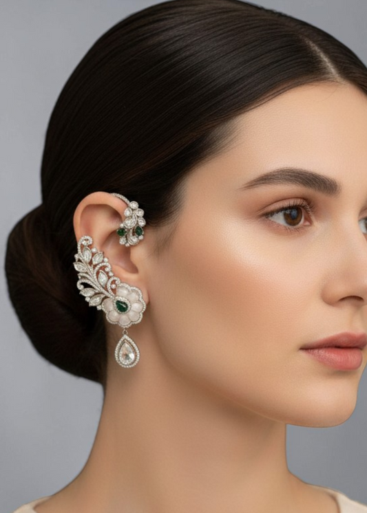 Model wearing Emerald Bloom Ear Cuff Set with emerald green crystals and floral statement ear jewelry.