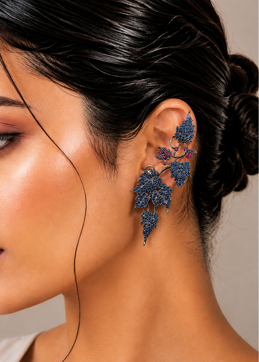 Side profile showcasing Ivy Bloom Blue Ear Cuffs with floral-inspired blue stone detailing