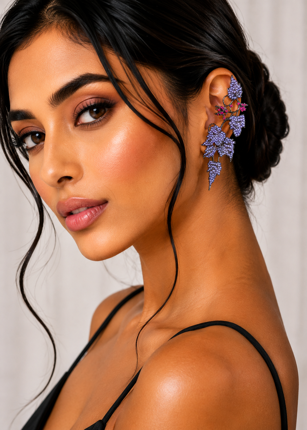 Side profile featuring Ivy Bloom Purple Ear Cuffs with statement purple stone ivy leaf design