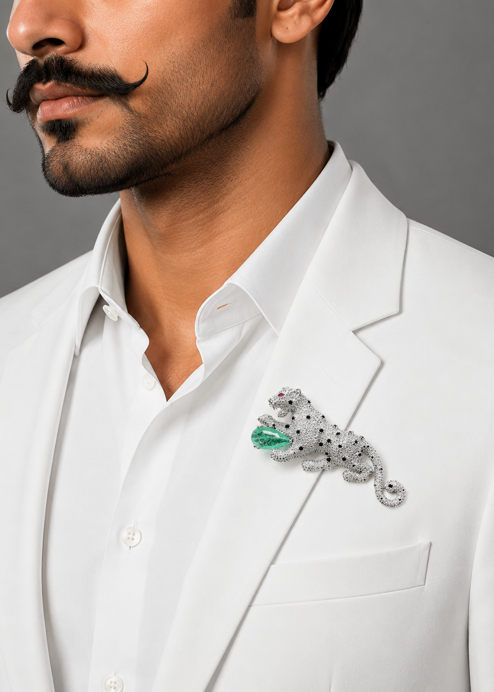 Model wearing Regal Mint Green Panther Brooch on a white outfit for elegant statement styling