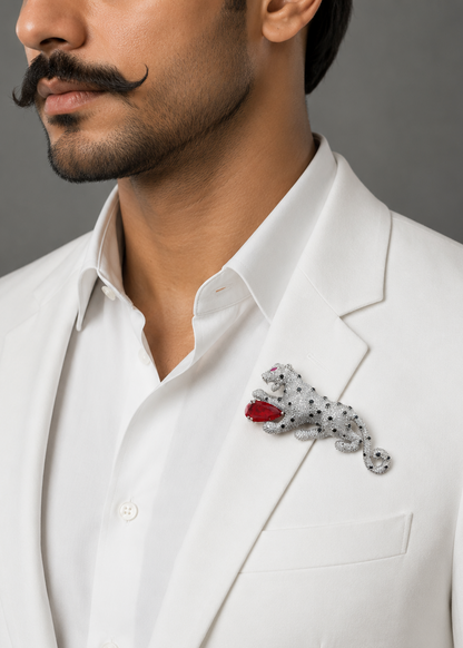 Model wearing Regal Red Panther Brooch on a white outfit for elegant statement styling