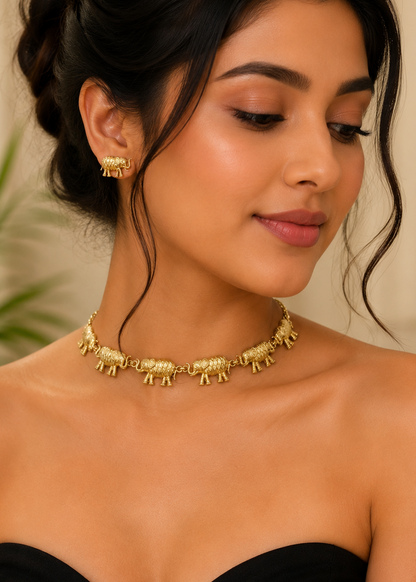 Model wearing Royal Elephant Necklace Set with matching gold elephant earrings for festive and wedding styling.